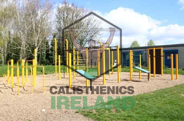 Outdoor calisthenics park at Tymon Park in Dublin, equipped with bars and workout stations for strength and functional training